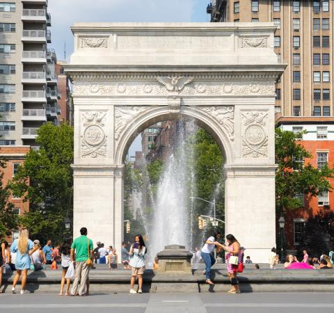 People on a summer day in Washington Square Park. 