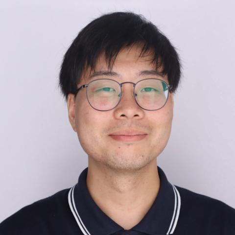 Headshot of Eric Chen, Program Administrator