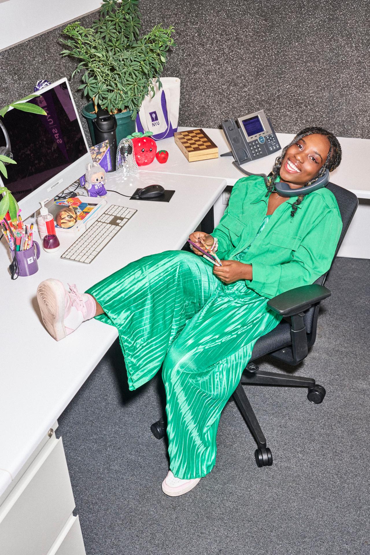 Latavia on the phone in an office