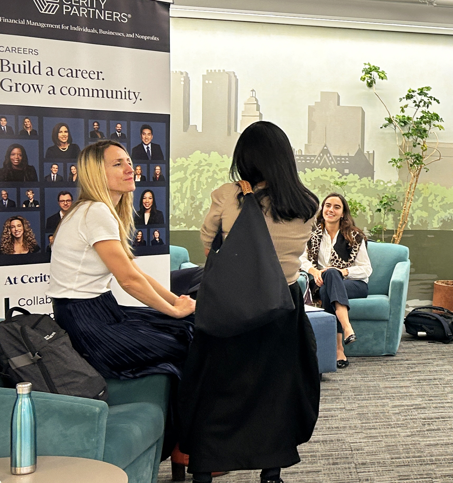 Member of the NYU SPS community congegrate in a lounge outside an NYU SPS Career event.