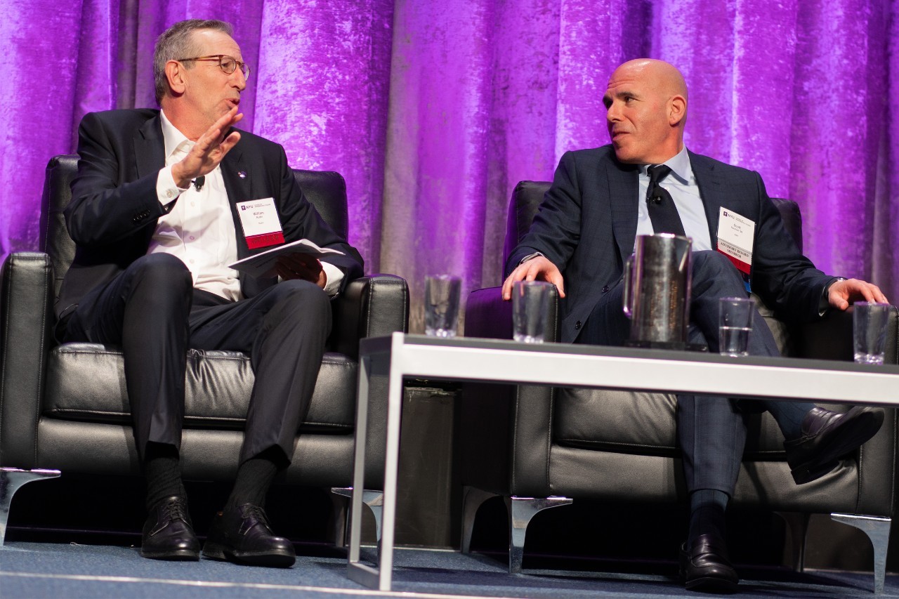 Bill Rudin of Rudin Management (l) and Scott Rechler ’90 of RXR join the popular annual Golden Apple Panel at the 2023 NYU Conference. 