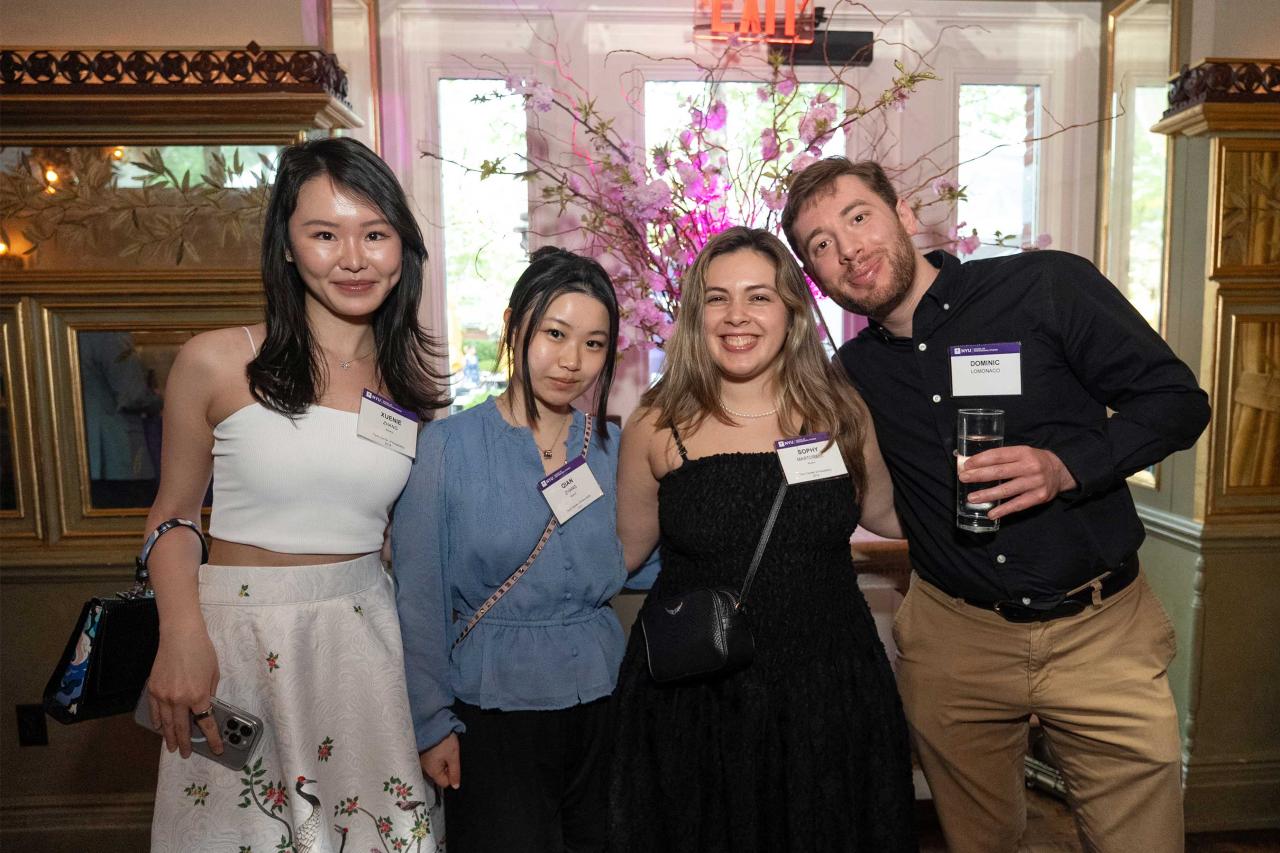 NYU SPS alumni posing for a photo