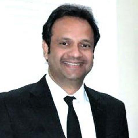 Headshot of Manish 