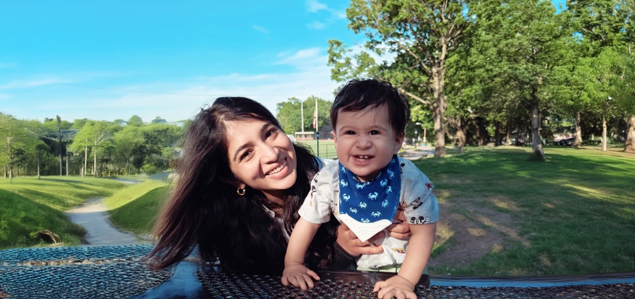 Ruchi Saveri, NYU SPS Center for Global Affairs alumnus, smiles for the camera with his partner and son.