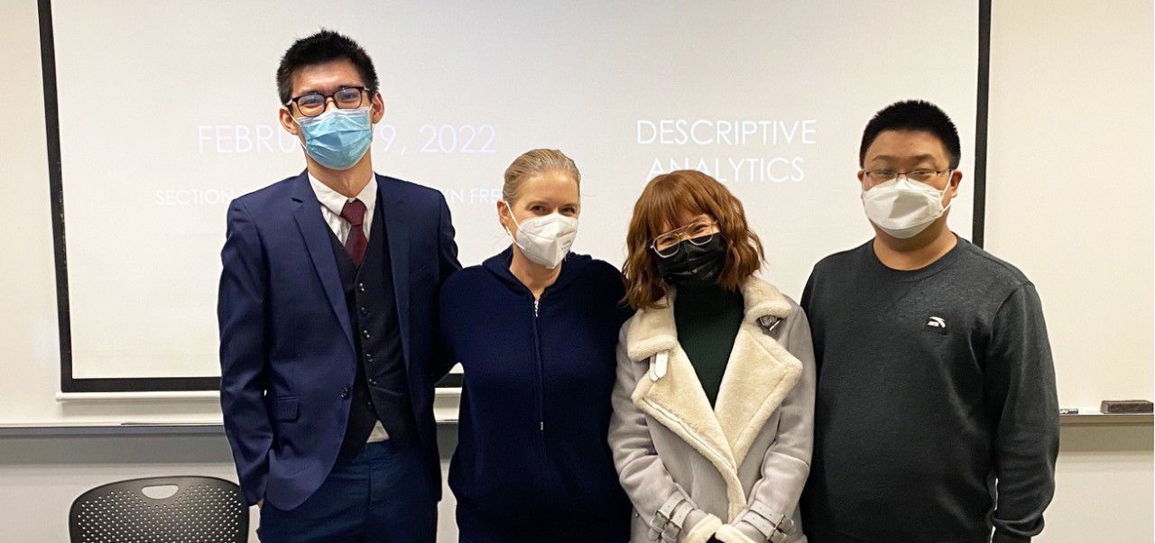 Caroline Fredey takes a picture with three other NYU colleagues.