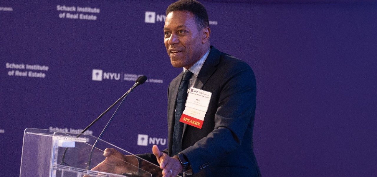 Marc Norman, Clinical Professor, Schack Institute of Real Estate, NYU SPS, takes the stage to give a keynote presentation. 