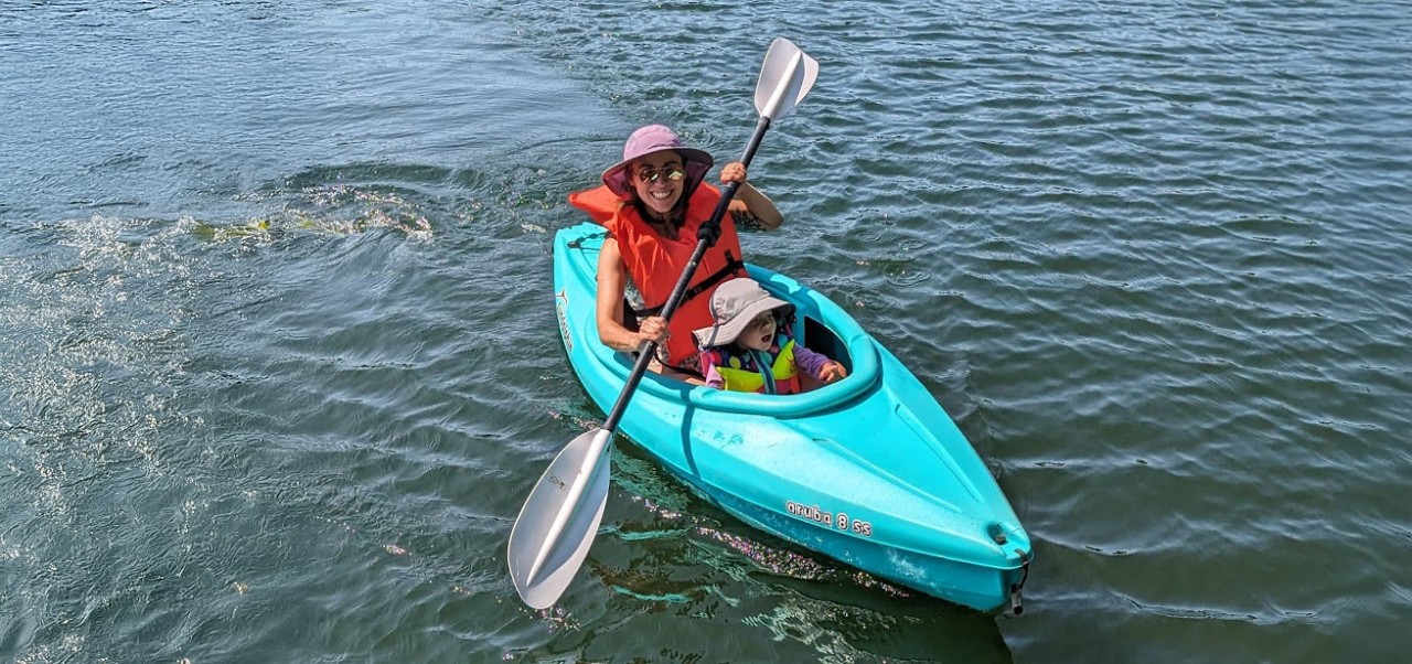 Victoria Chavez-Kruse, Adjunct Instructor, Center for Applied Liberal Arts, NYU SPS, kayaks on a body of water.