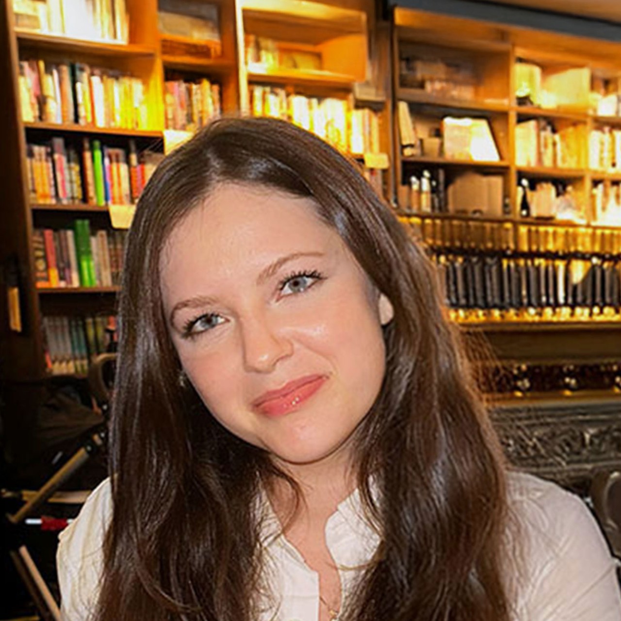 Brooke Houghton, student at the Center for Publishing and Applied Liberal Arts at NYU SPS, poses for a photo at a bookstore.