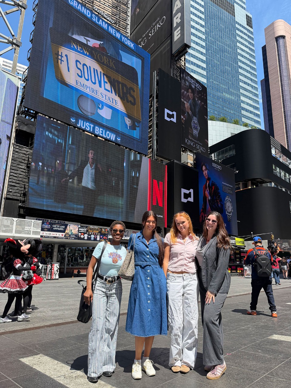Brian Atkins in a group photo at Times Square