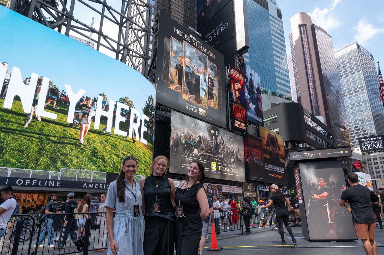 Elizabeth Kisova in a group photo in Times Square