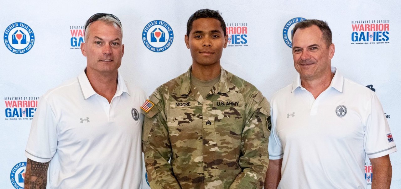 Maurice Moore, student at the NYU SPS Division of Applied Undergraduate Studies, pictured with colleagues in the armed forces.