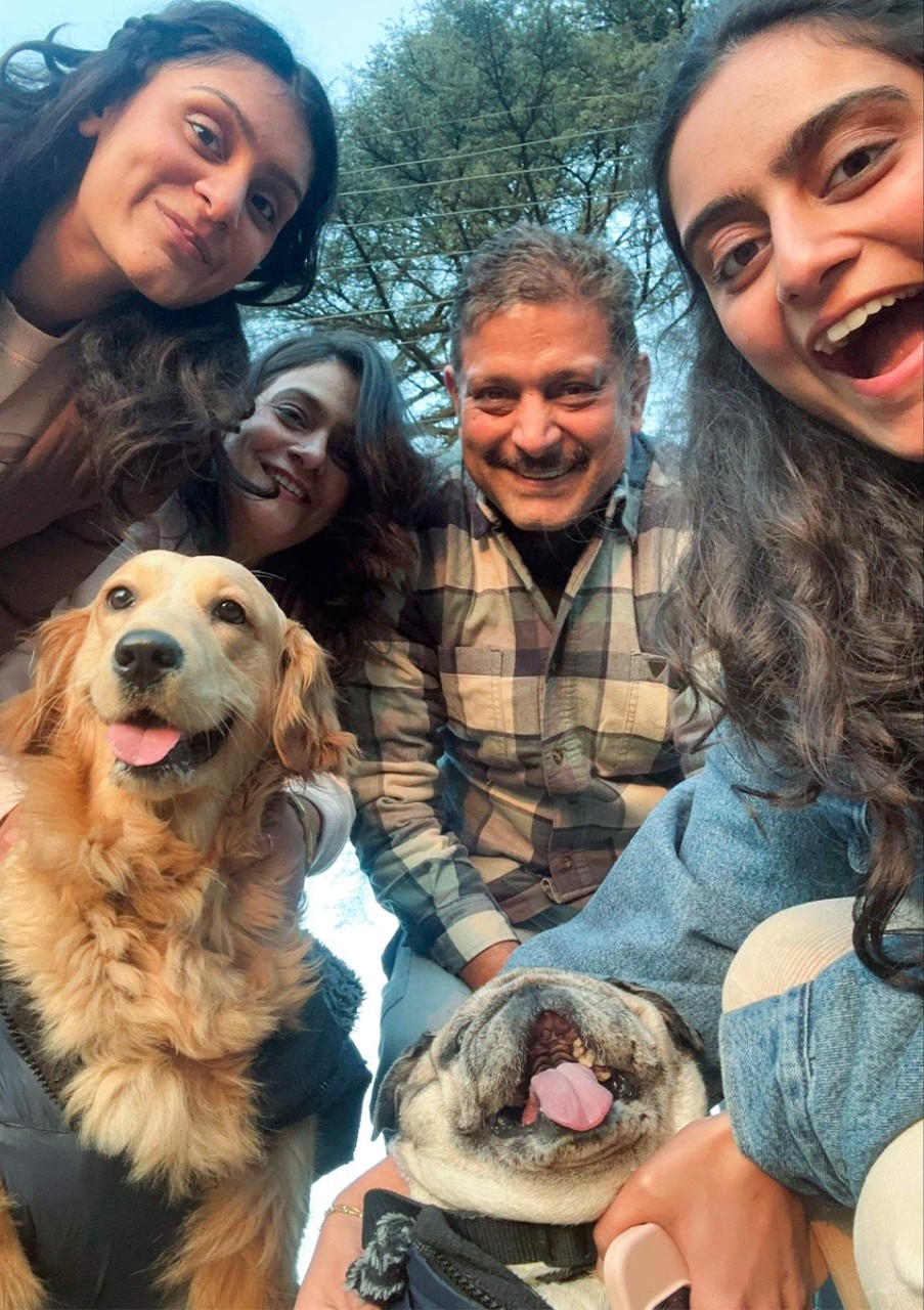 Sejal Tandon takes a selfie with family, friends, and pets.