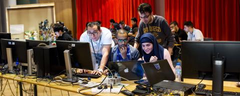 students working on a project on computers