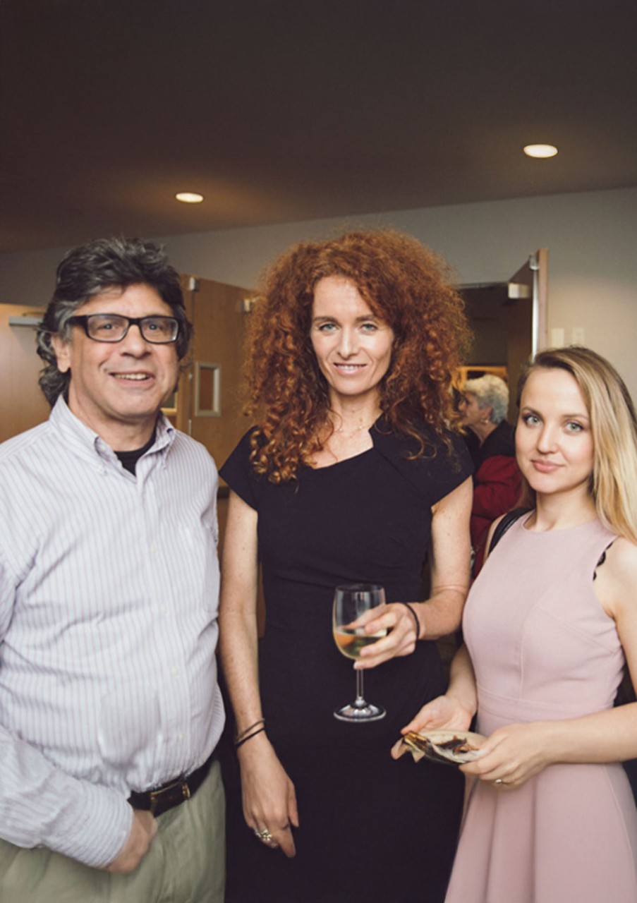 Liubov Volkova chats with faculty at a CGA function.