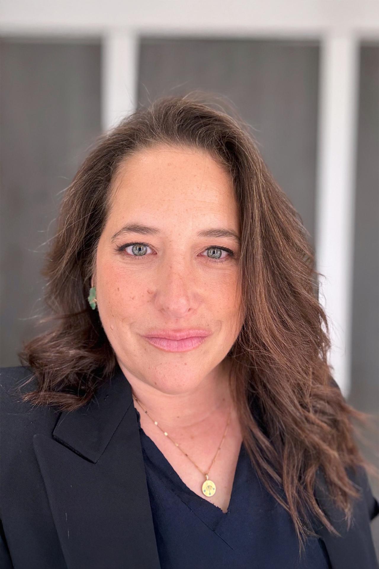 NYU SPS CE instructor Abby Russell smiles for a headshot