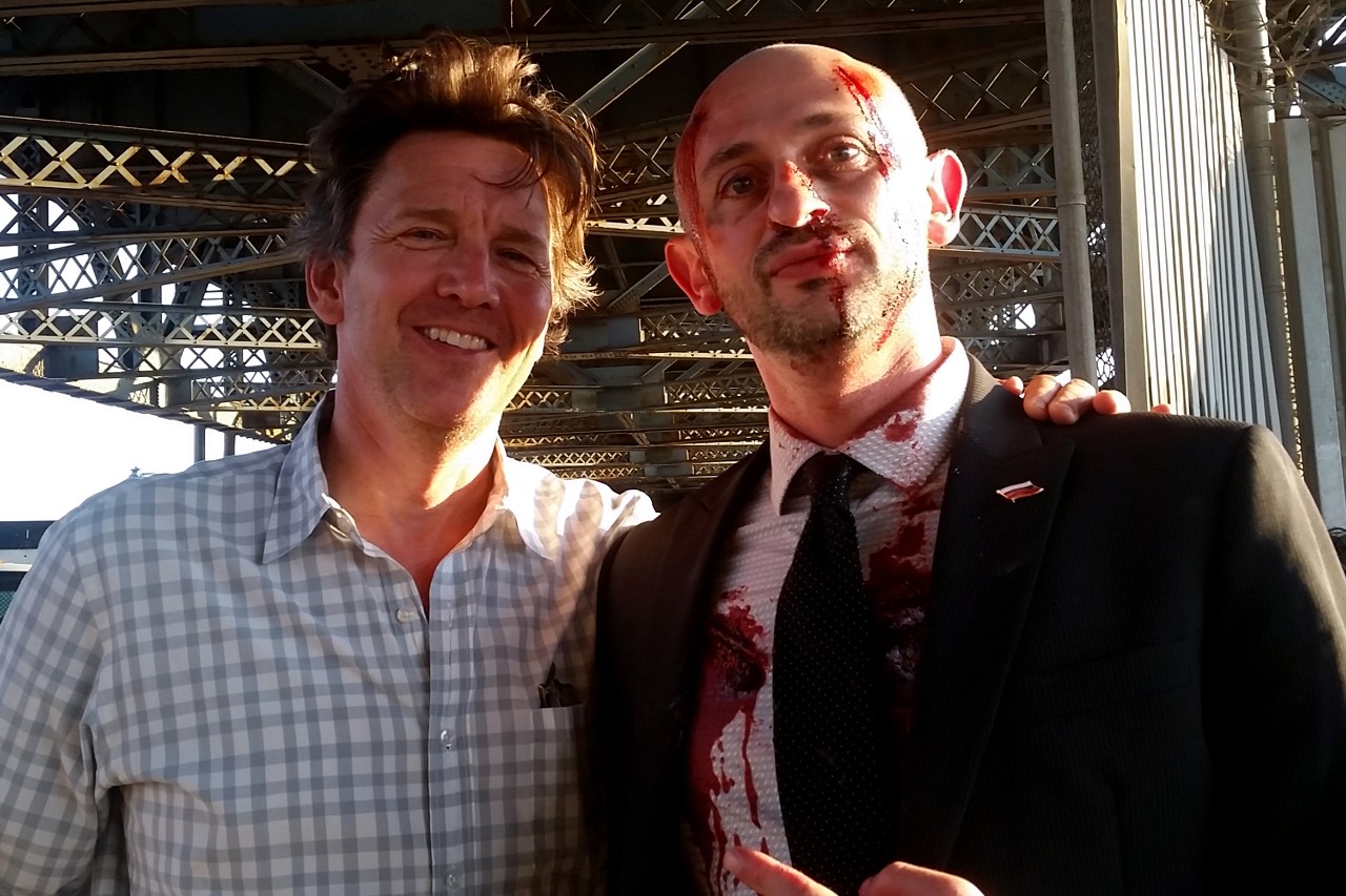 NYU SPS Continuing Education instructor Boris Keivsky poses for a photo with a colleague while wearing gore makeup on a film set