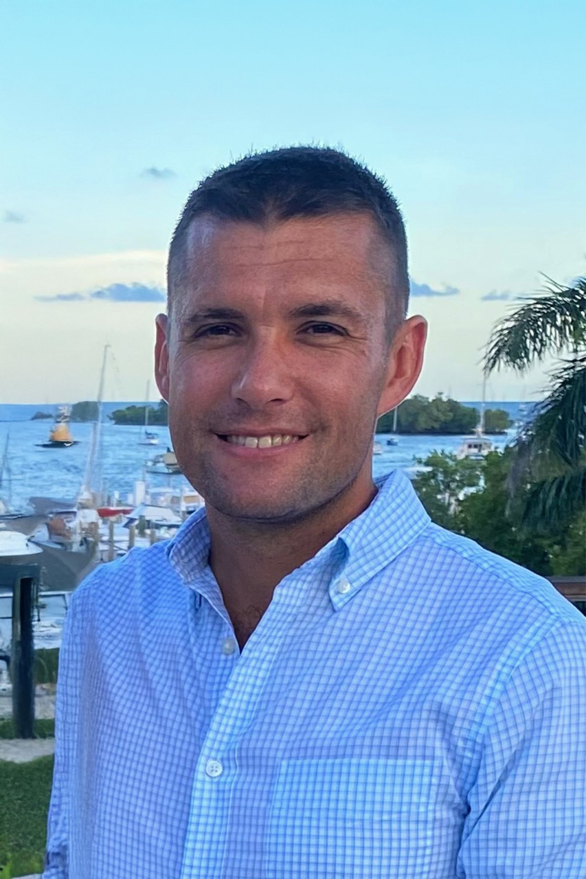 NYU SPS CE instructor Justin Redmond smiles for a photo