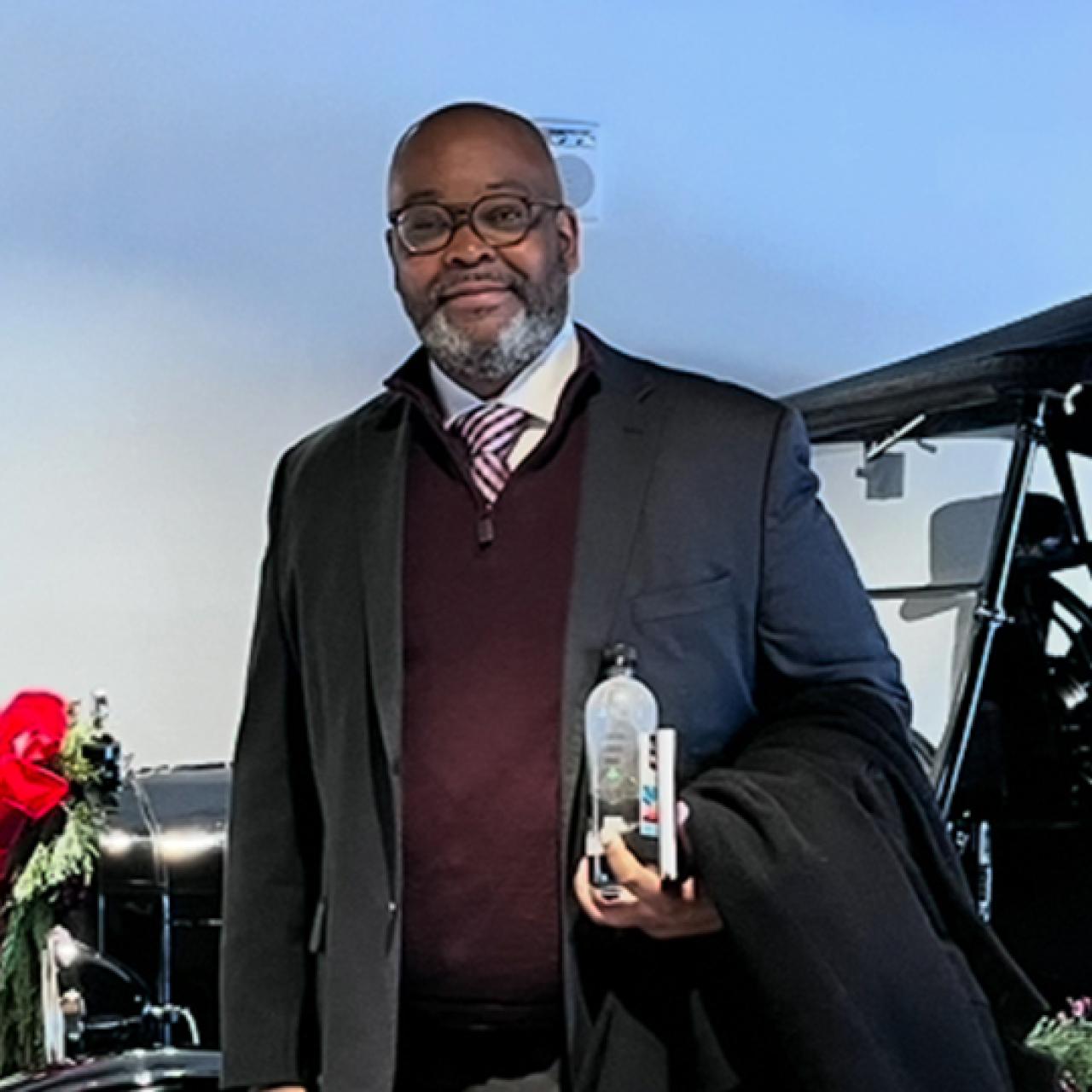 Headshot of Brian C. Barker.