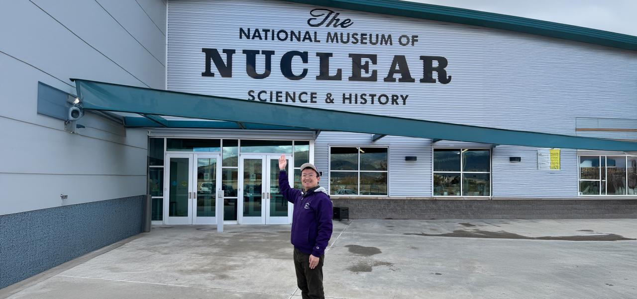 Jian Liu, Adjunct Assistant Professor, Division of Applied Undergraduate Studies at NYU SPS, poses for a photo at the National Museum of Nuclear Science and History.