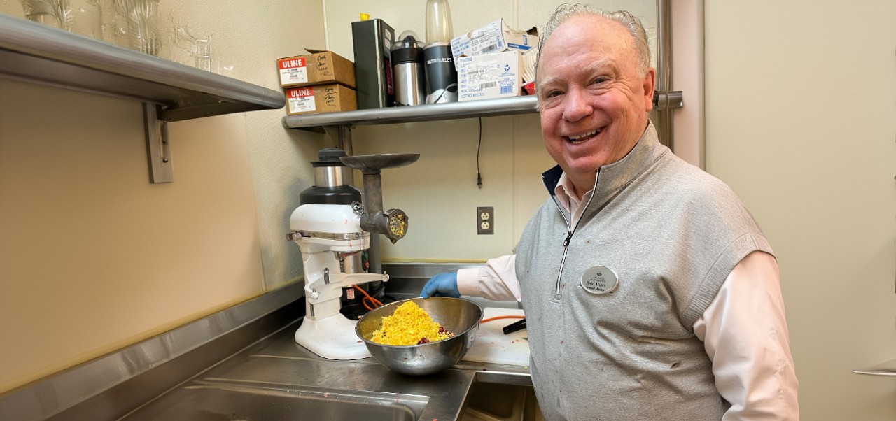 John Moser, Adjunct Professor at the Jonathan M. Tisch Center of Hospitality, cooking at the Lodge.