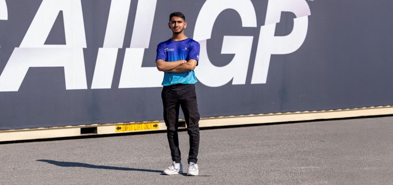 NYU SPS student Yash Gupta poses with NBA champion trophy