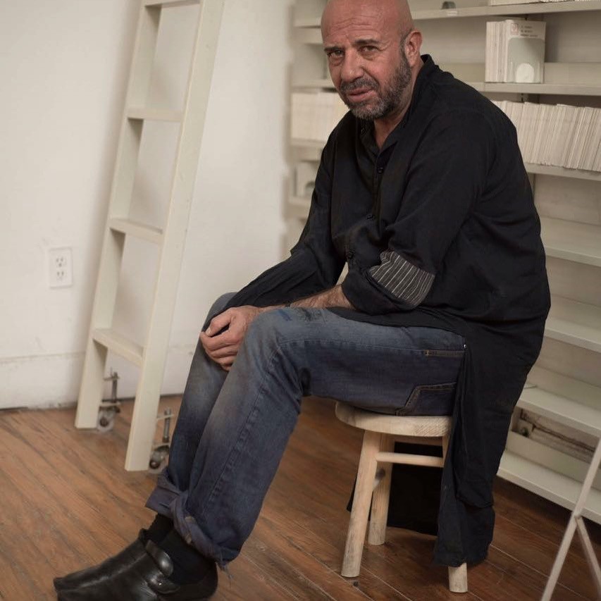 Man sitting on a stool