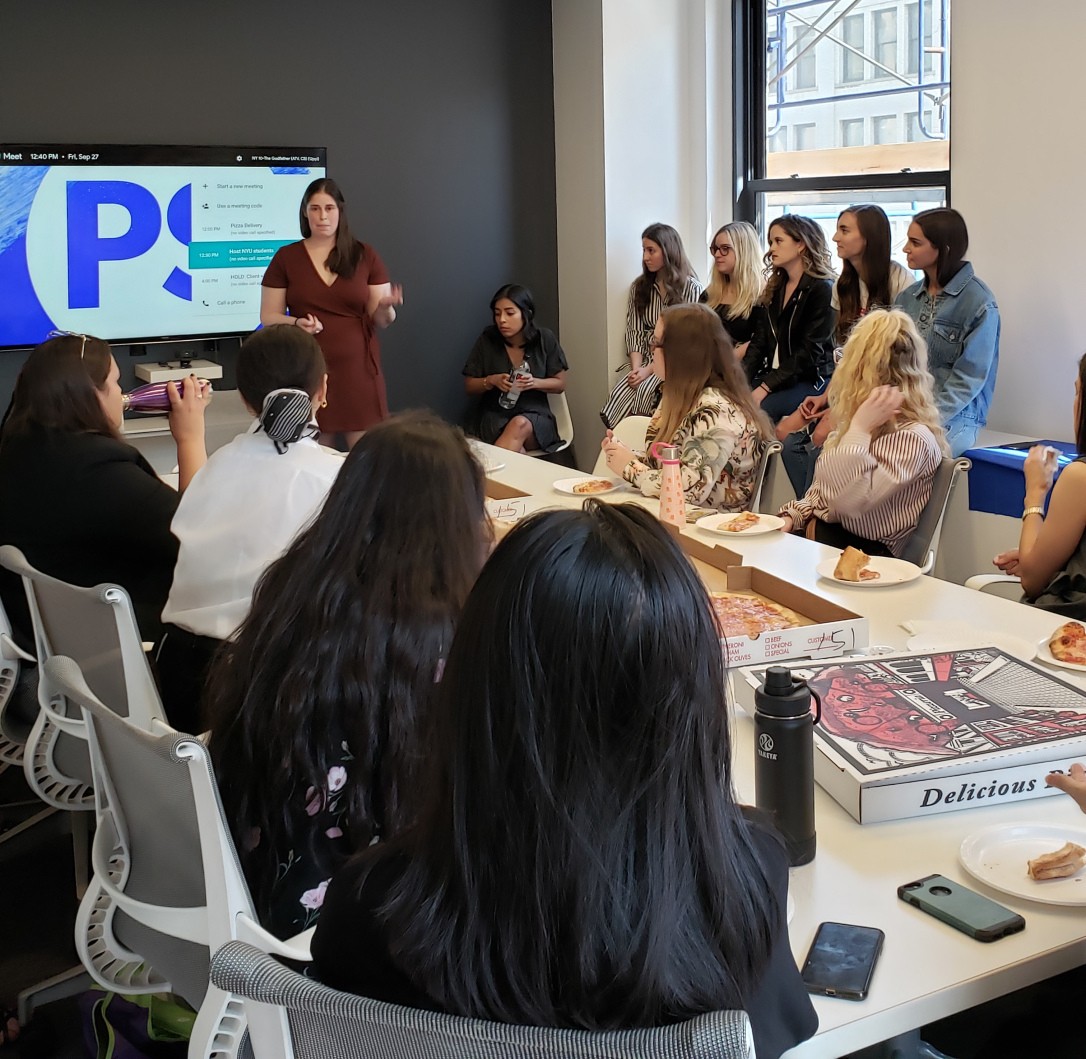 POPSUGAR editors Joanna Douglas  (standing), Alessandra Foresto (back, seated),Charisandra Perez, Katie Shafsky, Kathleen Harper, Victoria Messina and Perri Konecky (seated by window, l-r) speaking to M.S. in Publishing students.