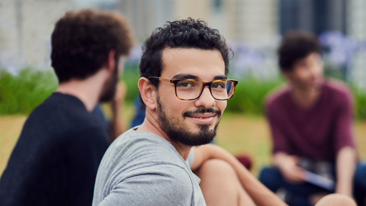 Transfer Student Smiling With Friends