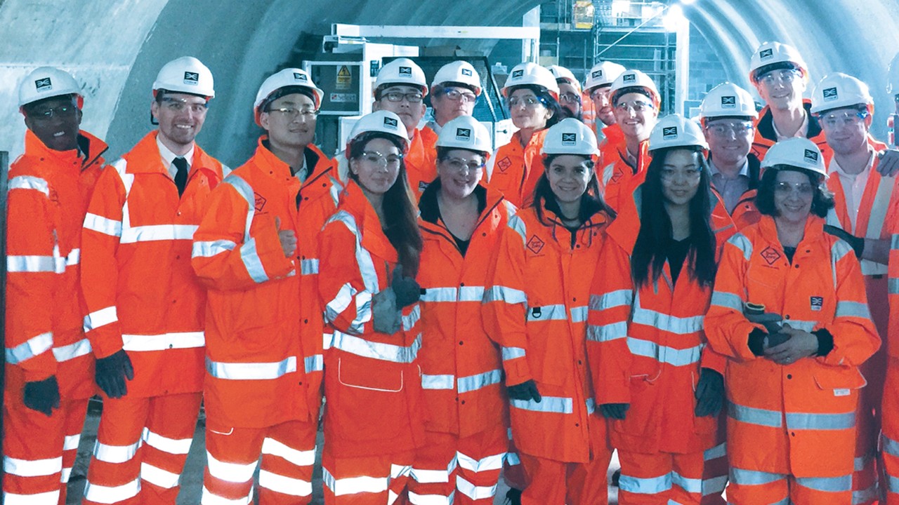 Group of students in construction outfits