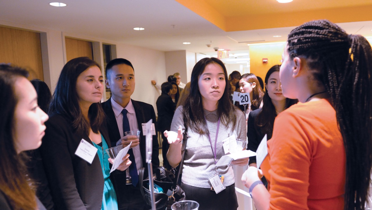 Students listening to faculty