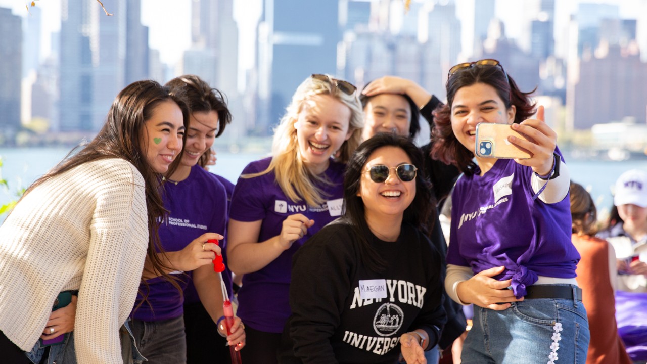 Students in front of skyline